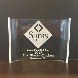 An acrylic crescent award by Race Rewards.